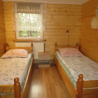 Domek Pod Lasem. Gospodarstwo agroturystyczne. Kindziuk Roman i Elżbieta