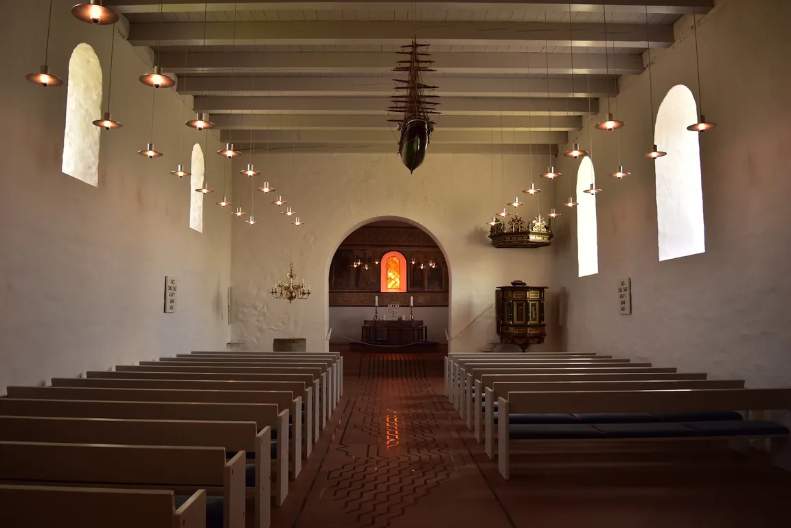 Jelling Mounds, Runic Stones and Church