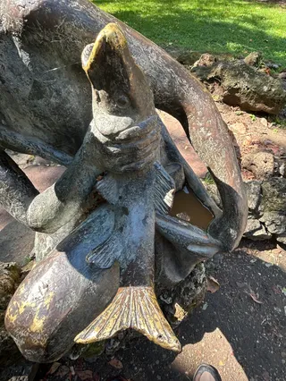 Boy with Fish Statue